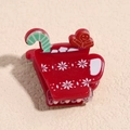 Détail de la pince à cheveux en résine de Noël avec bonhomme en pain d'épices et flocons - Thème Mugs de Noël