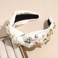 Detailed view of white satin knotted headband with pearls, rhinestones and mini footballs - Off-white