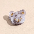 Dettaglio molletta a forma di orso in acetato colorato con marmo glitterato oro - Stile Orso / Orso Grigio