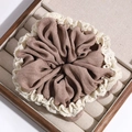 Detail of coffee striped scrunchie with lace edge in a wooden jewelry organizer tray - Khaki Lace