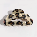 Detailed top view of a classic leopard print acetate hair claw clip on white background - Scalloped Khaki