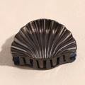Close-up of shell-shaped hair claw clip with dark coffee color and golden glitter finish - Small Size Coffee