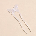 Dettaglio della forcina per capelli a farfalla perlata con design a U in resina avorio - Stile Farfalla / Bianco