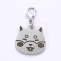 Close-up of shiba inu shaped stainless steel pet ID tag with lobster clasp and ring - 25mm / Shiba Inu