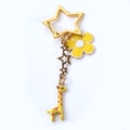 Portachiavi giraffa a cartone con fiore giallo e catena a stelle dorate decorativa - Giraffa dal Collo Lungo