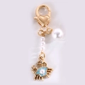 Portachiavi con chiusura a cuore dorato, perle bianche e ciondolo a granchio blu chiaro - Granchio Blu Perla