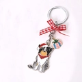 Portachiavi cane di Natale con cappello da Babbo Natale, fiocco a quadri e ciondolo in smalto - Cane Pastore con Cappello di Natale