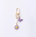 Chic purple butterfly keychain with white pearls and a daisy flower pendant on gold chain - Purple Butterfly and Flower Style (Starfish Butterfly)