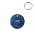 Close-up of a round blue glitter pet ID tag with a silver fishbone icon and key ring - Dark Blue