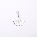 Detailed close-up of a Saint Bernard dog breed tag pendant in polished silver stainless steel - Brittany Spaniel Style / 25mm