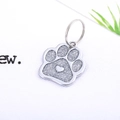 Glittering silver paw-shaped pet ID tag with a heart motif on a metal split ring - 23*27mm / Silver