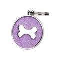 Macro detail of round purple glitter pet tag with white bone emblem and metal ring - Purple