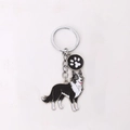 Border Collie dog keychain pendant with black and white enamel finish and paw print charm - New Border Collie