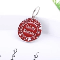 Red enamel round pet tag engraved with Call My Humans and bone patterns on white plate - 28mm / Red