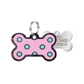 Detail of bone-shaped pet ID tag with pink enamel polka dots and engraved metal back - Pink