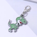 Cute green dinosaur enamel keychain with silver lobster clasp on a light grey surface - Green Tyrannosaurus (7)