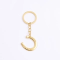 Glückshufeisen-Schlüsselanhänger mit flachem Ring und Hufeisen-Anhänger in Goldoptik - Gold