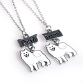 Close-up of Best Friend pet pendant necklace with carved text and dog charm - Samoyed