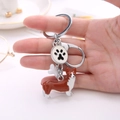 Porte-clés chien Corgi en alliage de zinc avec breloques os et patte polies - Corgi