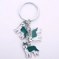 Porte-clés en métal argenté avec trois pendentifs de chiens husky vert et blanc - Husky Bleu