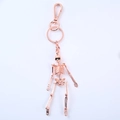 Portachiavi con scheletro umano in oro rosa con giunti mobili e gancio a molla - Confezione Regalo Nera / 130mm / Oro rosa
