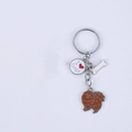 Detail view of a metal keychain set with brown Pomeranian dog and I Love Dogs charms - Brown Pomeranian With Heart