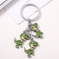 Cartoon green T-Rex dinosaur keychain with three enamel charms and silver ring - T-Rex
