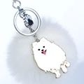 Détail du porte-clés pompon blanc avec pendentif Samoyède en émail et breloque patte - Loulou de Poméranie Blanc