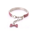 Collier pour animaux avec trois rangées de strass roses et pendentif os argenté - Rose