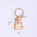 Bulldog enamel metal keychain in beige and orange finish with small bone charm decoration - New Pug Dog With Bone (Gold)