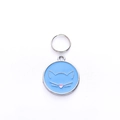 Close-up of a blue cat-shaped pet identity tag with pink heart nose and silver ring - 25mm / Blue