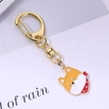 Portachiavi in metallo dorato con ciondolo a forma di Shiba Inu con sciarpa rossa - 2*7cm / Testa di Shiba Inu