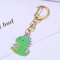 Simpatico portachiavi a forma di dinosauro verde in lega con moschettone dorato - 2*7cm / Dinosauro