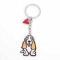 Detail of Basset Hound enamel keychain with a red heart charm and silver metal ring - Tricolor Basset Hound
