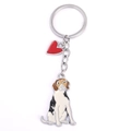 Detail of beagle dog keychain with colorful enamel coating and red heart charm - Sitting Beagle