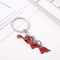Cartoon dinosaur keychain with three red enamel long-neck dragon charms on silver ring - Three Red T-Rex (Red String 2) / Red Dinosaur String 2