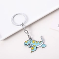 Porte-clés dinosaure de dessin animé bleu clair avec des taches jaunes et anneau - Dragon Bleu Clair Jaune
