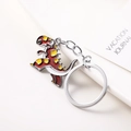 Porte-clés dinosaure en métal avec émail rouge et jaune et anneau argenté brillant - Dragon Rouge Jaune