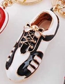Porte-clés chaussure de foot doré avec émail noir et blanc pour fans de sport - Noir et Blanc
