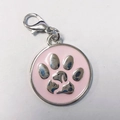 Macro shot of pink enamel pet ID tag with cat and dog silhouettes and silver lobster clasp - 25mm / Light Pink