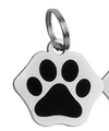 Detailed view of dog paw pet ID tag in polished silver finish with black enamel inlays - 2.5cm 4g / Silver