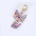 Llavero de gato geométrico colorido en esmalte con marco dorado y cierre de mosquetón - Estilo de gato geométrico multicolor