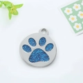 Dettaglio della targhetta rotonda per animali in acciaio con zampa glitterata blu - 2.5cm 5g / Blu
