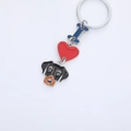 Cartoon dog and red heart metal keychain charm with blue letter I on white background - Doberman