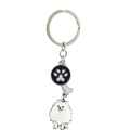 Silver metal pet keychain featuring a black paw print charm and white dog pendant - White Pomeranian
