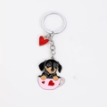 Cute cartoon Dachshund dog in a pink teacup enamel keychain with a red heart charm - Black Dachshund In Teacup With Heart