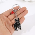 Bulldog keychain featuring black enamel finish with a small red heart pendant charm - Black French Bulldog