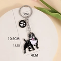 Black and white pitbull enamel keychain with paw print charm and metal ring - Strong Bully with Footprint
