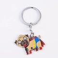 Cartoon pug superhero metal keychain with red cape and colorful enamel finish - Superhero Pug