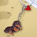 Brown and orange enamel dachshund keychain with a red heart pendant and silver ring - Waving Brown Dachshund